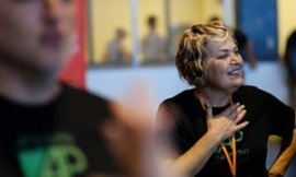 Leslie Dziezak beams after her son scores a win at the power lifting event at the Indiana Special Olympics in Terre Haute.